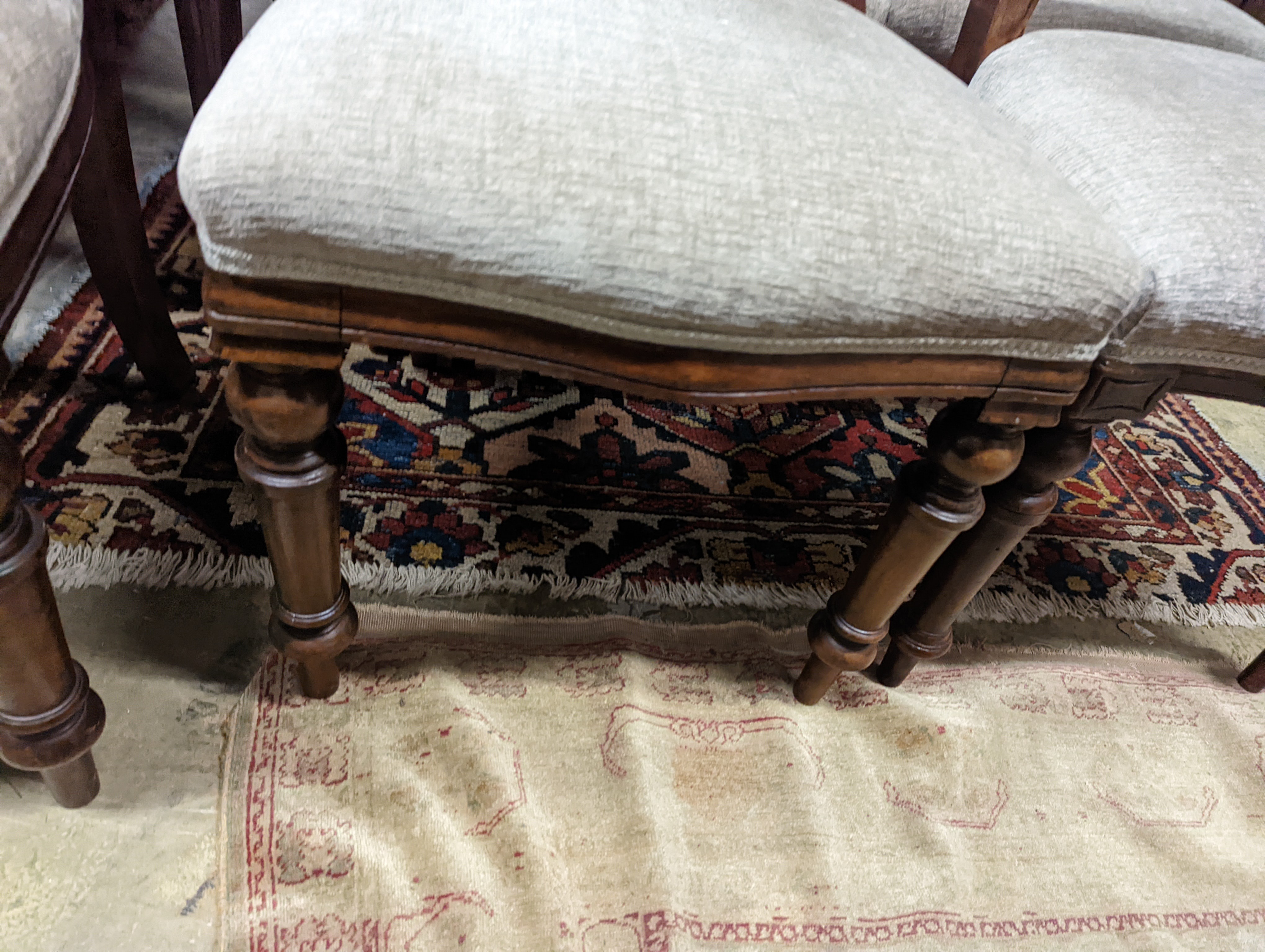 A set of six Victorian balloon back dining chairs